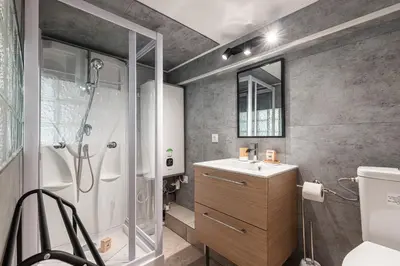 a bathroom with a shower and a sink at Lively district - Duplex Old Town in Nice