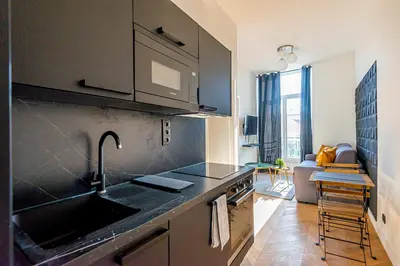 a kitchen with a sink and a counter top at 304 B Charming apartment refurbished super in Nice