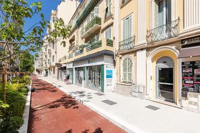 an empty street in a city with buildings at Studio Duplex Carré d'Or in Nice