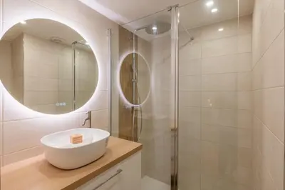 a bathroom with a sink and a shower at Magnifique 2P avec vue sur le port de Nice in Nice