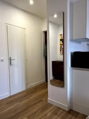 a room with a mirror and a hallway with a door at EZE Roc (Monaco) in Èze