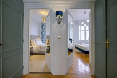 a hallway with a door leading to a living room at Luxury apartment in City Center of Nice in Nice
