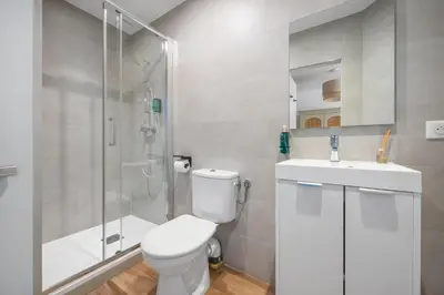 a bathroom with a shower and a toilet and a sink at App-Art in Nice