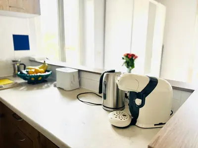 a coffee maker on a counter in a kitchen at Villa Reine - Nice in Nice