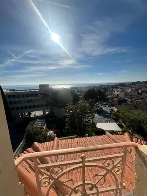 a view from the balcony of a building at Villa Reine - Nice in Nice