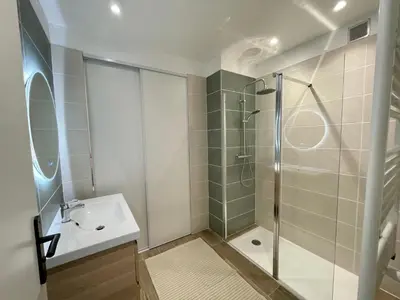 a bathroom with a shower and a sink at Bright appartment with view in Cagnes-sur-Mer