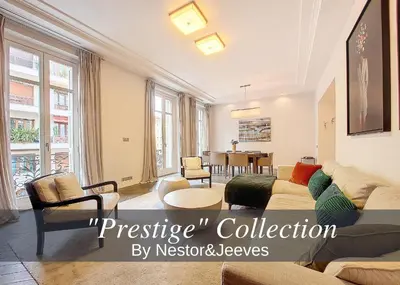 a living room with a couch and a table at Nestor&Jeeves - VICTOIRE - Central - Near Beach in Nice