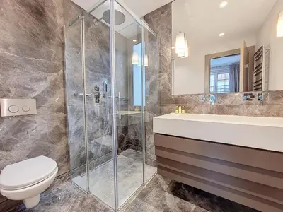a bathroom with a shower and a toilet and a sink at Nestor&Jeeves - VICTOIRE - Central - Near Beach in Nice