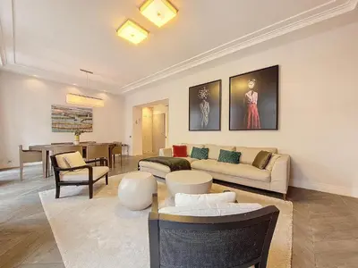 a living room with a couch and a table at Nestor&Jeeves - VICTOIRE - Central - Near Beach in Nice
