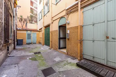 an alley in an alley between two buildings at Lovely 1 Bdr Port Area in Nice