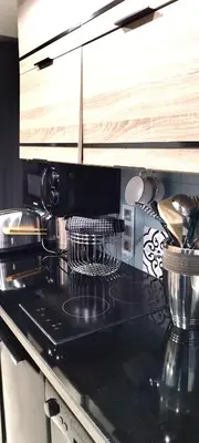 a kitchen counter top with a drying rack on it at Riviera Cocoon - Nice Center in Nice