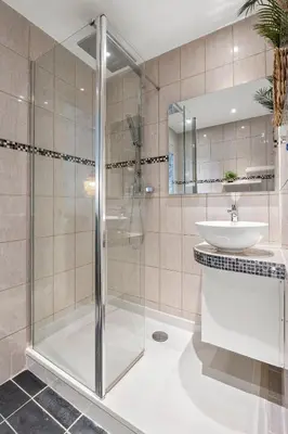 a bathroom with a shower and a sink at Nice Renting - FODERE - Charm & Comfort 2P Heart of Nice - AC & WiFi in Nice