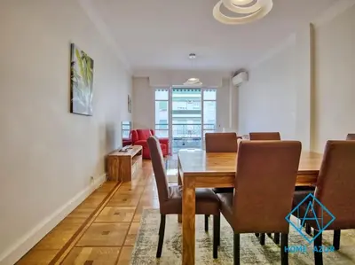 a dining room with a table and chairs at NEW Luxurious apartment - Jean Medecin in Nice