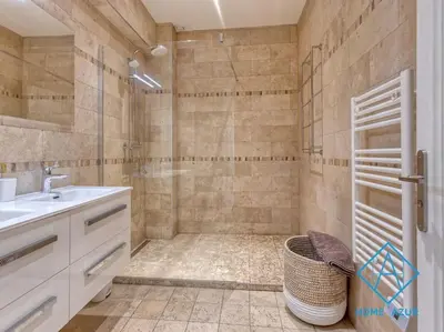 a bathroom with a sink and a shower at NEW Luxurious apartment - Jean Medecin in Nice