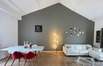 a living room with a white table and a couch at Magenta MaMa - Comfort & Charm in Nice Carré d'Or - Near beach in Nice