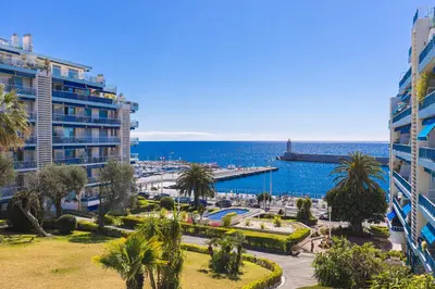 a view of the ocean from a city with buildings at Franck Pilatte - Parking, Wifi, AC, 3pers in Nice