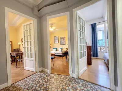 a hallway with doors leading to a living room at Nestor&Jeeves - PROVENCAL - Central - Near Beach in Nice