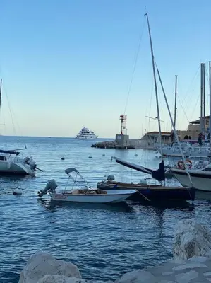 a group of boats are docked in a harbor at Loft - centre historique in Villefranche-sur-Mer