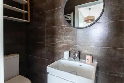 a bathroom with a sink and a mirror at L33 2P Jean Médecin centrale/ 2 Balcony & AC in Nice