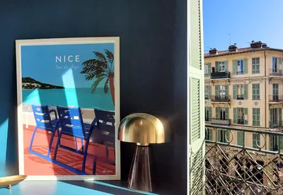 a framed picture on a table next to a window at Nestor&Jeeves - ECLAT NICOIS - Central - Near beach in Nice