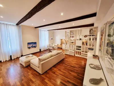 a living room with a couch and a table at 