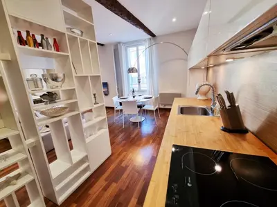a kitchen with a sink and a counter top at 
