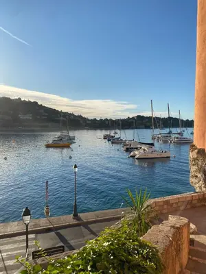 a bunch of boats are docked in a harbor at Logement Atypique in Villefranche-sur-Mer