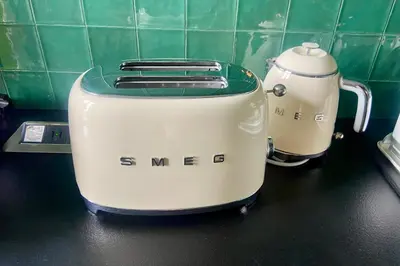 a toaster and a tea pot sitting on a counter at Close to the beach behind the famous Negresco ! in Nice