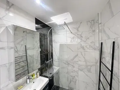 a white bathroom with a sink and a shower at Nestor&Jeeves - PALMA BEACH - Proche Mer in Nice