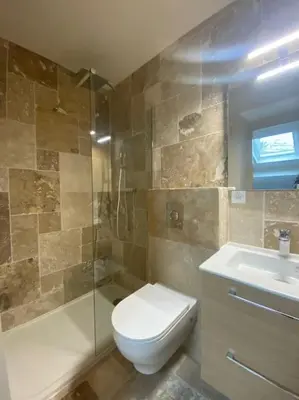a bathroom with a toilet and a shower and a sink at Duplex sur Nice - Libération in Nice