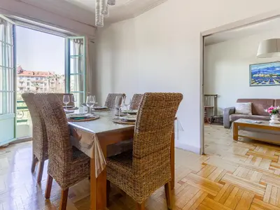 a dining room with a table and chairs at Apartment Le Victor Hugo by Interhome in Nice