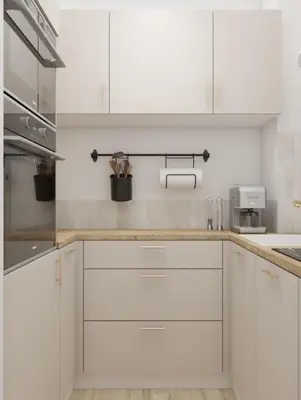 a kitchen with white cabinets and a counter top at ZEN & COSY - CARRÉ d'OR - Hyper centre - Plage in Nice