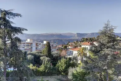 a view of a city with trees and buildings at Nice Absea Belles Terres 5 in Nice