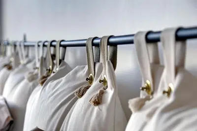 a row of white dresses hanging on a rack at Nice Absea Belles Terres 5 in Nice