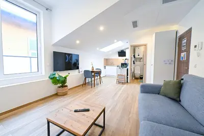 a living room with a couch and a table at Beau studio cozy centre ville et plages n13 in Nice