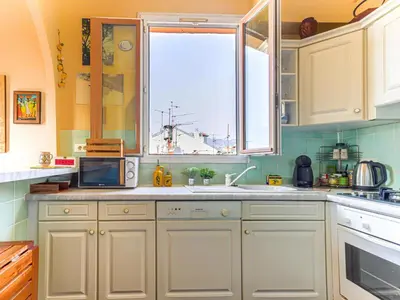 a kitchen with a sink and a window at Apartment L'Île de Beauté by Interhome in Nice