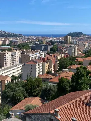 a view of a city with buildings and roofs at APPARTEMENT-NICE 01 VUE MER - PANORAMIQUE WIFI-Parking in Nice