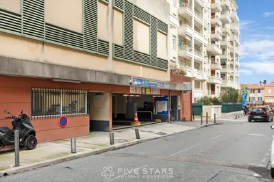 a motorcycle parked in front of a building at Studio Californie FSHH in Nice