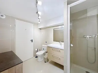 a bathroom with a shower and a toilet and a sink at Villa kriss in Nice