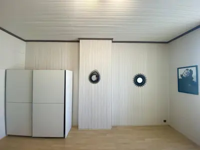 a room with a refrigerator and two mirrors on the wall at Grand F3- Centre ville de Nice, Wifi AC in Nice