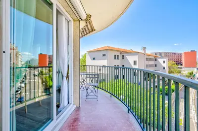 a balcony with a view of the city at Confortable 2 pièces 54 m2 proche de la mer in Nice
