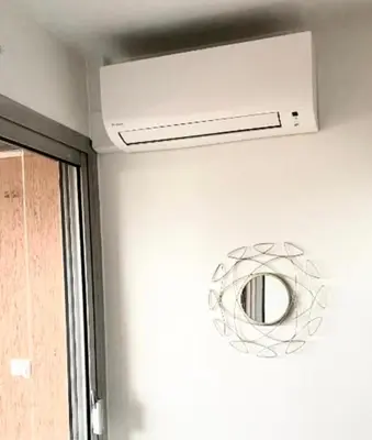 a room with a ceiling fan and a mirror at Sea View Apartment - Private Parking, Swimming Pool, Air Conditioning in Cagnes-sur-Mer