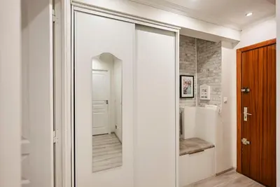 a sliding glass door in a bathroom with a walk in shower at Moderne 2/3 Pièces près du Port in Nice