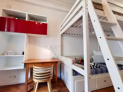 a room with a desk and a loft bed at Appartement Nice Bellecour in Nice