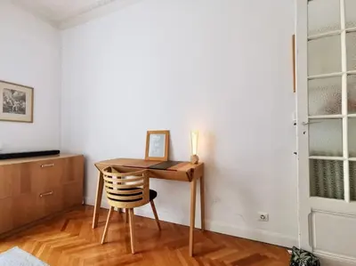 a desk with a chair in a room at Appartement Nice Bellecour in Nice