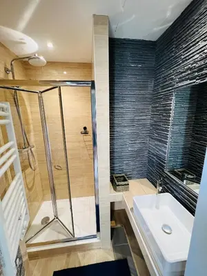 a bathroom with a shower and a sink at Joyau rare port de Nice in Nice