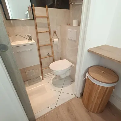 a small bathroom with a toilet and a sink at Cocooning Atmosphère old Nice in Nice
