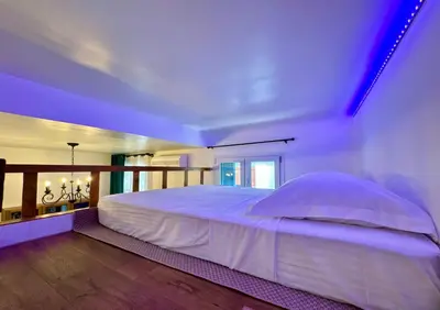 a bedroom with a large white bed in a room at Central Riviera Charm in Nice