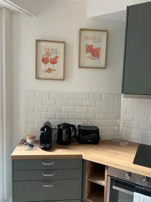 a kitchen with a counter top with a counter sidx sidx sidx at Studio centre-ville Beaulieu-sur-Mer in Beaulieu-sur-Mer