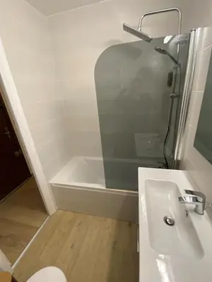 a bathroom with a shower and a sink and a toilet at Appartement Nice Magnan in Nice